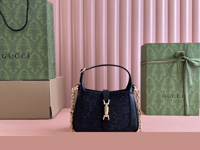 G*u*i top handle bags